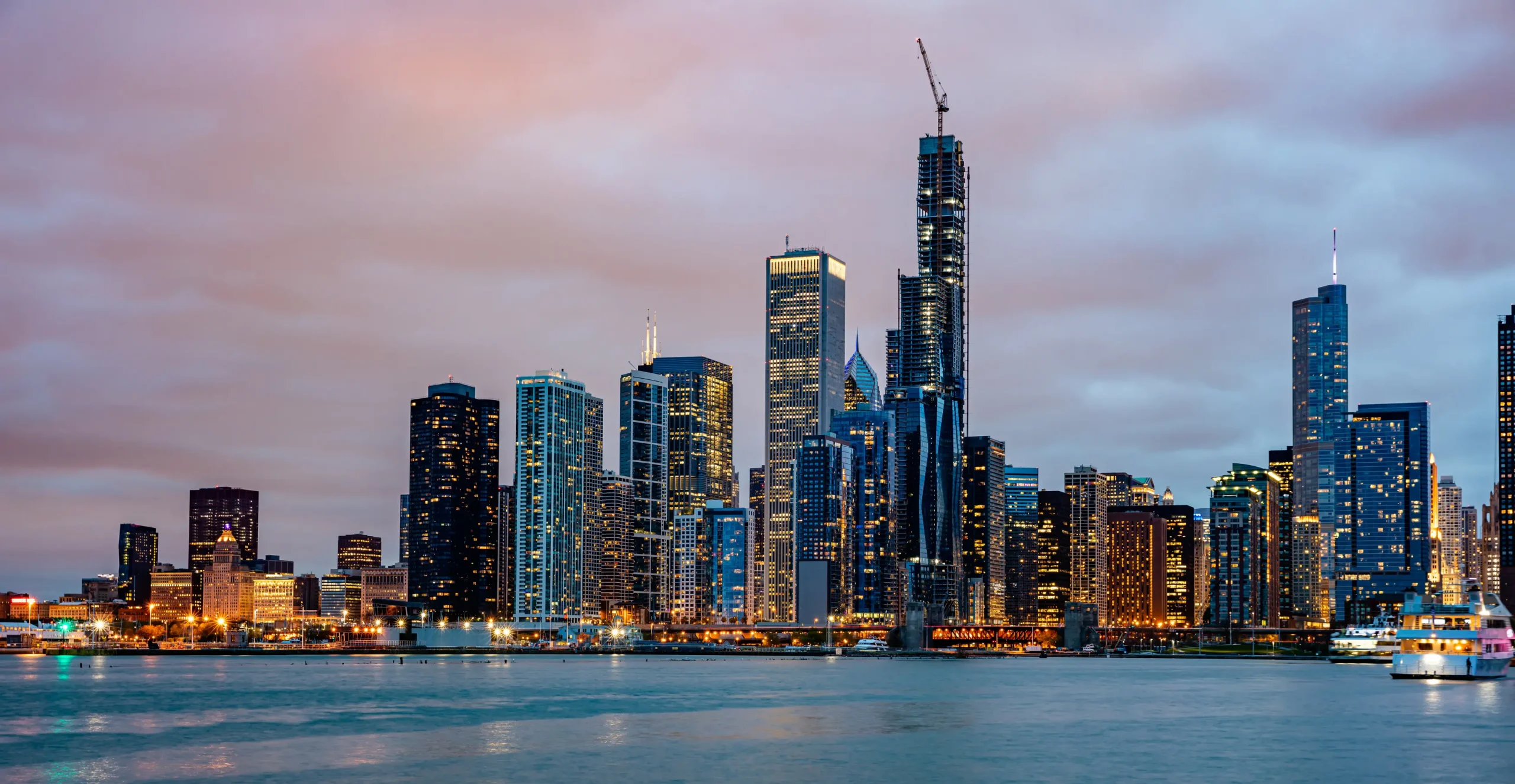 panoramic-view-chicago-city-high-rise-buildings-cloudy-sky-evening